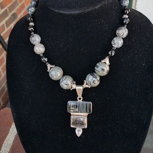 Women’s beaded necklace with Charles Albert pendant